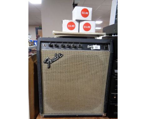 A Fender Sidekick Bass 30 guitar amplifier together with three Fender and Epiphone amp foot switches 