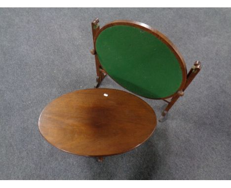 A 20th century oval occasional table on Queen Anne legs together with a folding oak card table  