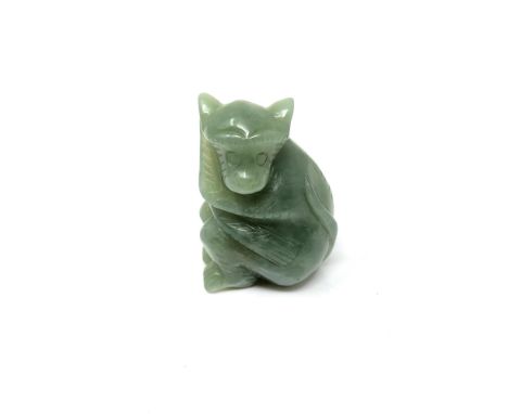 A carved Chinese jade figure of a monkey, height 6 cm.