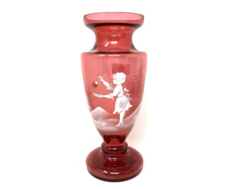 A Mary Gregory style ruby glass vase, height 27cm
