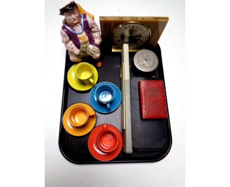 A tray containing Whittard coffee cans and saucers, mid 20th century mantel clock, Melba Ware Henry VIII character jug, post 