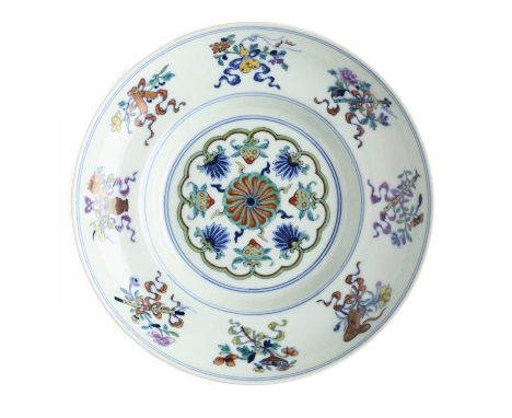 A CHINESE DOUCAI 'ANBAXIAN' OGEE DISH brightly enamelled to the interior with a ruyi medallion enclosing a full-faced flower-