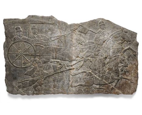 A CHINESE CARVED GREY STONE PANEL FRAGMENT  carved in low relief with equestrian figures and horse drawn chariots, 38 by 64 c