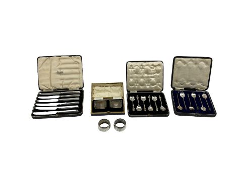 Pair of engine turned serviette rings, cased and engraved with initials Birmingham 1929, pair of plain silver serviette rings