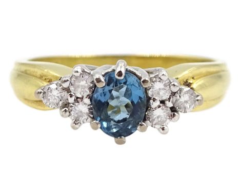 18ct gold oval blue topaz and six stone round brilliant cut diamond cluster ring,Condition Report:Approx 3.65gm, size L, head