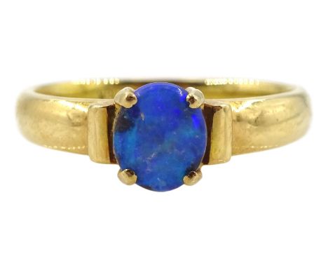 Gold single stone opal ring, stamped 18KCondition Report:Approx 3.2gm, size M-N, possibly been backed, 