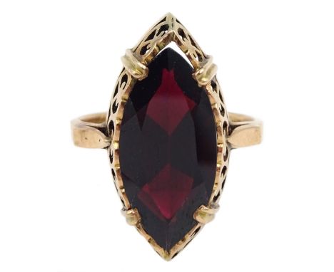 10ct gold single stone marquise shaped garnet ring, with pierced galleryCondition Report:Approx 5.5gm, size N-O, max depth = 