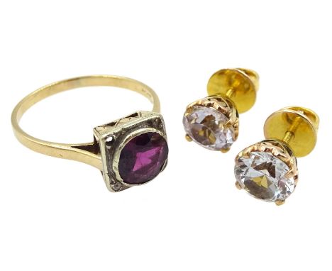 Pair of gold clear stone set stud earrings and a gold purple stone and diamond ringCondition Report:Ring tests 14ct (hallmark