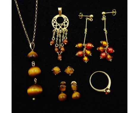 9ct gold tigers eye and glass bead jewellery including pendant necklace, three pairs of earrings, ring and pendantCondition R