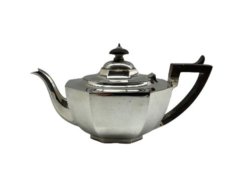 Silver teapot of panel sided design with ebonised handle and lift London 1921 Maker Charles Alfred Alston 19oz gross