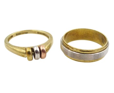 White and yellow gold spinner ring and a tri-coloured gold beaded spinner ring, both hallmarked 9ctCondition Report:Approx 6.