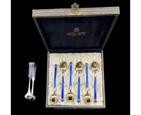 Set of six Norwegian silver gilt and blue enamel coffee spoons with leaf shape finials by David Andersen in case and a pair o
