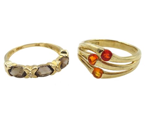 Gold smokey quartz and diamond ring, stamped 10K and a 9ct gold three stone fire opal ring, hallmarkedCondition Report:Approx