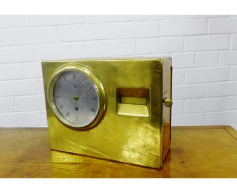 The Kosmoid Time Recorder in an oak case with brass front and carry handle to side with a silvered dial and Roman numerals an