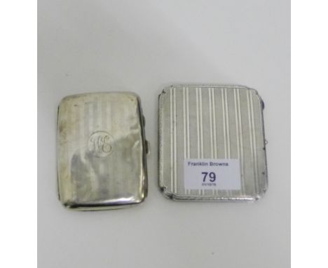 A Birmingham silver cigarette case together with another with engine turned decoration, largest 7.5 x 9 cm (2) 