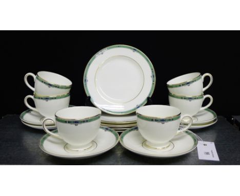 A Wedgwood jade pattern bone china white glazed teaset with gilded rims, comprising six cups, six saucers and six side plates