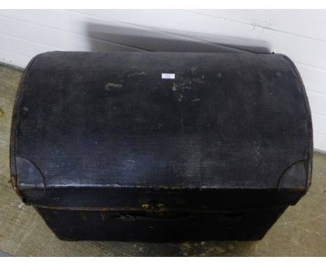 Canvas domed top storage trunk, with leather handles to front and sides with brass fittings 