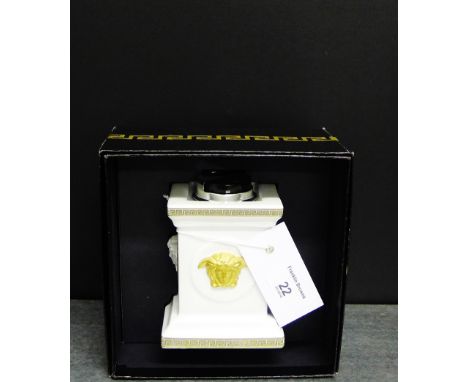 A Versace white glazed table lighter with classical motifs and Greek key borders, complete with its box