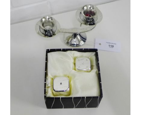 Arthur Price silver plated dice salt and pepper pots, in original box together with a silver plated candlestick (2) 