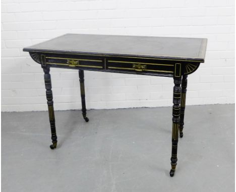 A black ebonised aesthetic style writing desk, the rectangular top with an incised motif to centre with a burr wood border ov
