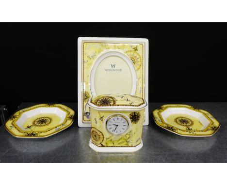 A collection of Wedgwood Atlas patterned porcelains to include a photograph frame, small clock and two octagonal dishes (4) 