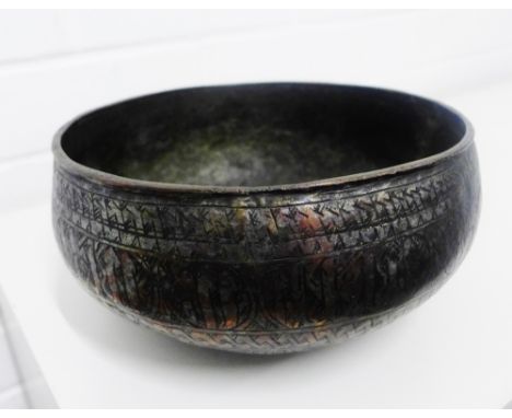 An antique Islamic tinned copper bowl with a band of Mamluk style Arabic calligraphy, 24 x 12cm