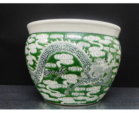 A famille verte planter with dragon pattern and coloured fish to the interior, 23cm diameter 
