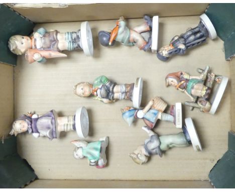 A Collection of Nine Goebel Hummel Child Figures