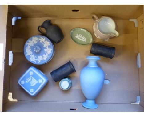 A collection of Wedgwood jasper and basalt ware including a pair of black basalt spill vases, powder blue trinket boxes etc (