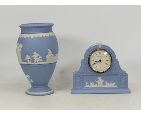 Wedgwood powder blue jasperware to include a mantle clock(not tested) also a bountiful vase 20cm tall(seconds) (2)