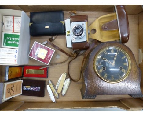 Mixed collectables to include a small Smiths oak cased mantle clock, cased Ilford camera, cigarette lighters including Colibr