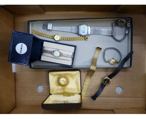 A collection of mostly ladies watches including a Buler mechanical fob watch, ladies Accurist gold plated watch, boxed Sekond