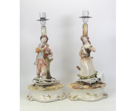 Capodimonte, A Pair of figural ceramic table lamps. Height: 44cm
