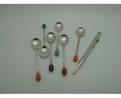 A 'Graf Von Faber Castell' Pen, of engine turned design; together with a set of six harlequin coffee bean spoons, with variou