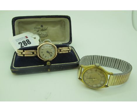 Rolex; A Vintage 9ct Gold Cased Ladies Wristwatch, the unsigned textured dial with Arabic numerals, the movement stamped "Rol