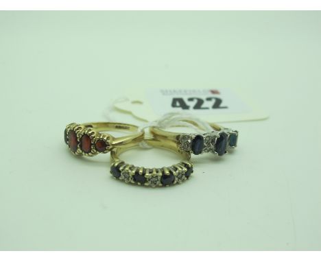 A 9ct Gold Half Eternity Style Ring, graduated claw set stones, within inset highlights, between wide tapering shoulders (fin