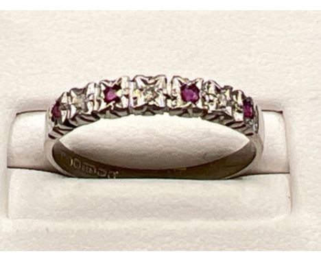 Ladies 9ct white gold Ruby and diamond set ring. Size R (2g)