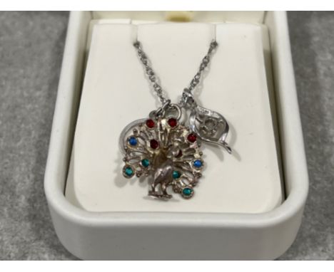 Silver twist link chain with 3 silver pendants