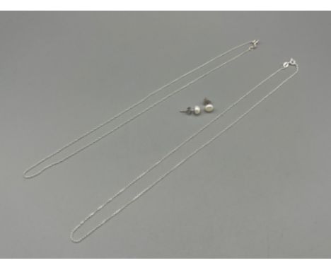 Brand new ex display sterling silver ladies pearl earrings and 2 silver chains 18”