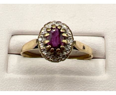 Vintage ladies 9ct gold Ruby and diamond cluster ring. Size N (2.2g)