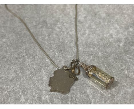 Silver snake link chain and 3 pendants