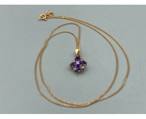 Ladies 9ct yellow gold amethyst and diamond cluster pendant and 9ct yellow gold chain 2.3g gross