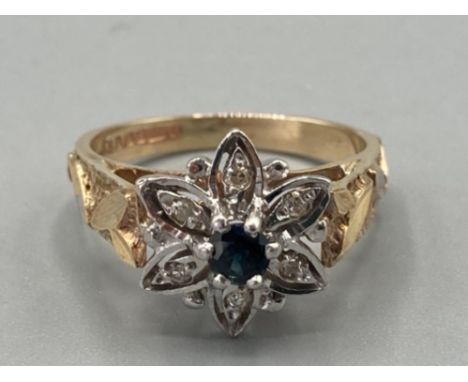 Ladies 9ct yellow gold sapphire and diamond cluster ring of floral design size L 3.6g gross