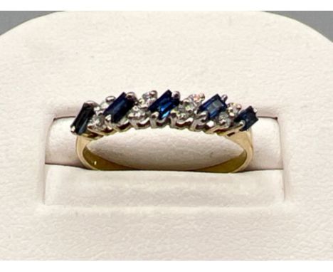 Ladies 9ct gold blue sapphire and white stone ring. Size P (1.7g)