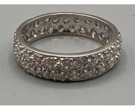 Brand new ex display 9ct white gold white stone eternity ring. Size J1/2 (2.5g)