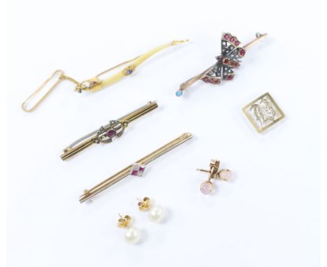 Four assorted yellow metal and gem set bar brooches, including a ruby and diamond four stone set, 56mm and a Victorian yellow