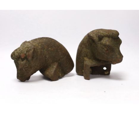 A pair of cast iron bull's head post finials, 13cm***CONDITION REPORT***PLEASE NOTE:- Prospective buyers are strongly advised