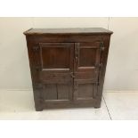 A late 17th century oak two door cupboard, width 106cm, depth 48cm, height 118cm***CONDITION