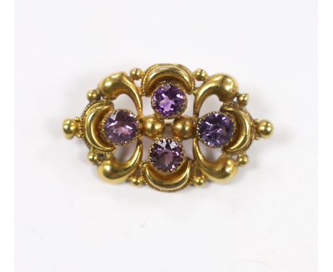 A late Victorian yellow metal and amethyst cluster set oval brooch, 45mm, gross weight 7.2 grams.***CONDITION REPORT***PLEASE