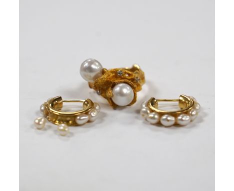 A recent 750 yellow metal two stone cultured pearl and three stone diamond chip set modernist ring, size M/N, gross 9.7 grams